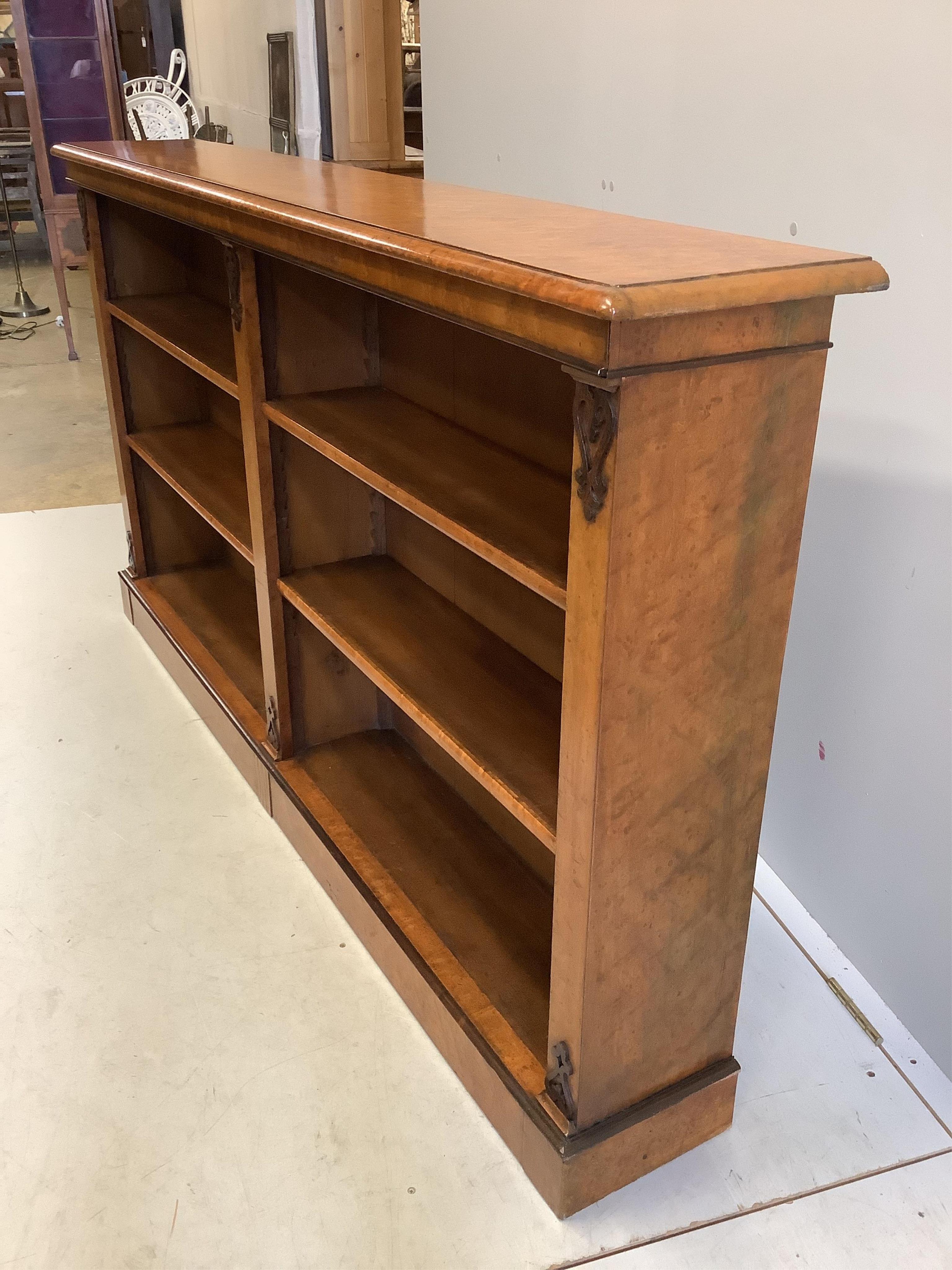 A Victorian bird's eye maple dwarf open bookcase, width 172cm, depth 27cm, height 95cm. Condition - good